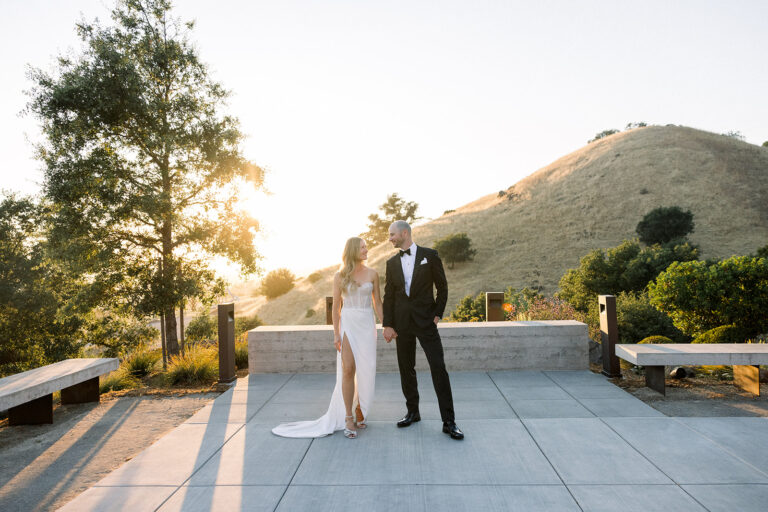 Wedding couple on sunset terrace