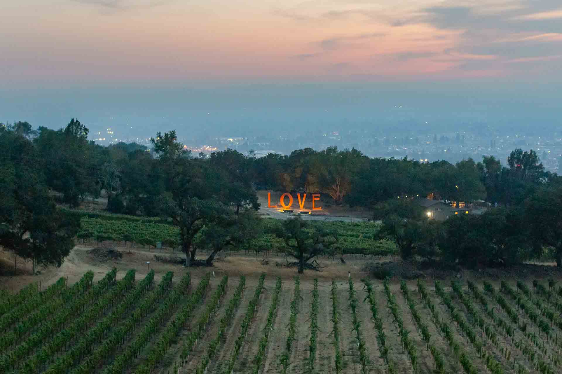 A magical romantic view from the Veranda of the iconic LOVE sculpture glowing in the distance.